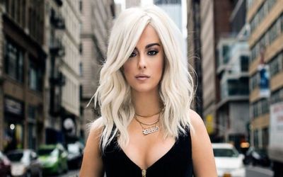 Bebe Rexha Reveals The Secret To Her Bleach Blond Hair And How She Keeps It From Falling Out